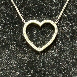 475813 10k wg White topaz heart pendant 18”
